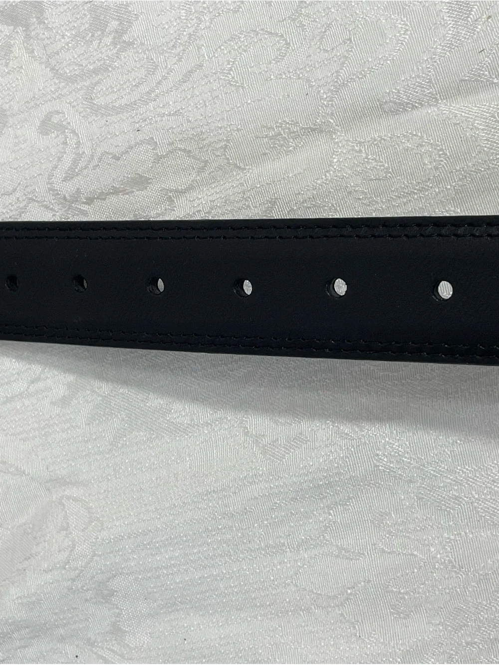 Dickies Black Leather Belt with Silver Tone Metal Buckle.